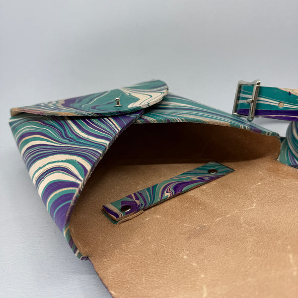 Looking into the bag, flap open.