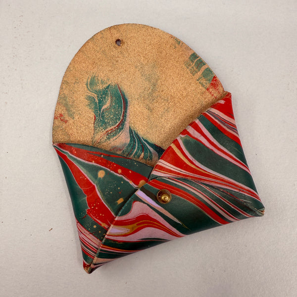 Looking at the front of the purse, flap open