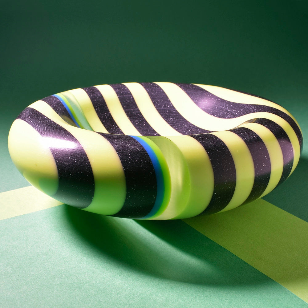 Green black Corian bowl by Graham Lester