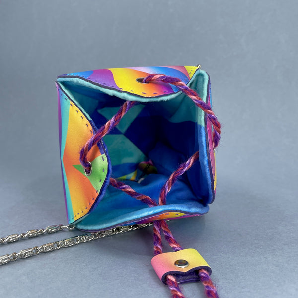 Looking into the small Fiesta bag by Elizabeth Bond as the bag is laid on its side