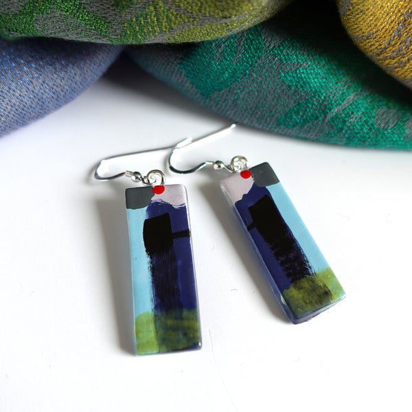 rectangular earrings with sterling silver hook earwires. Navy, lilac and red abstract design in glass and enamel