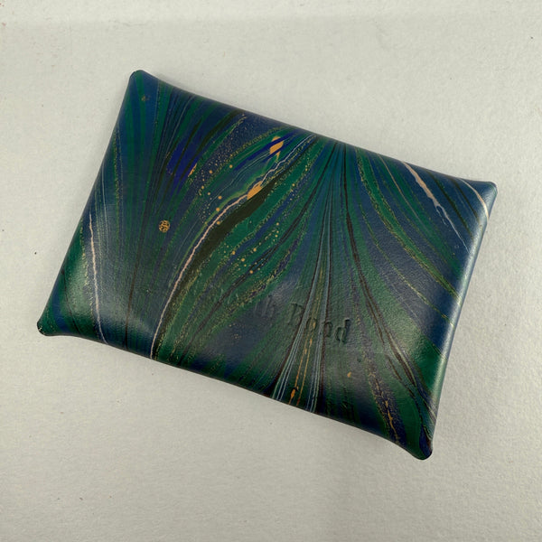Looking at the back of the purse