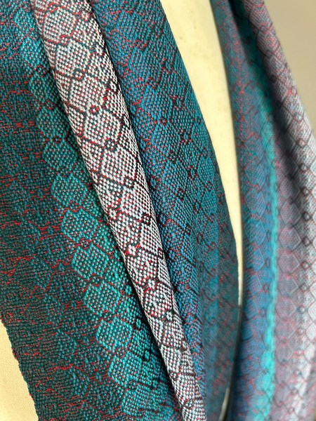 Close-up of textured fabric with a pattern on a beige background