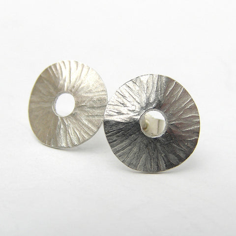 Radiant silver stud earrings