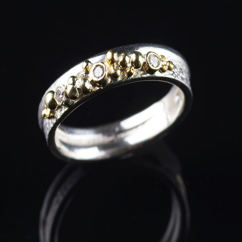 Gold and silver ring with diamonds