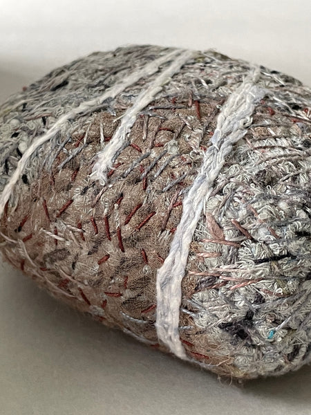 Small stitched stones