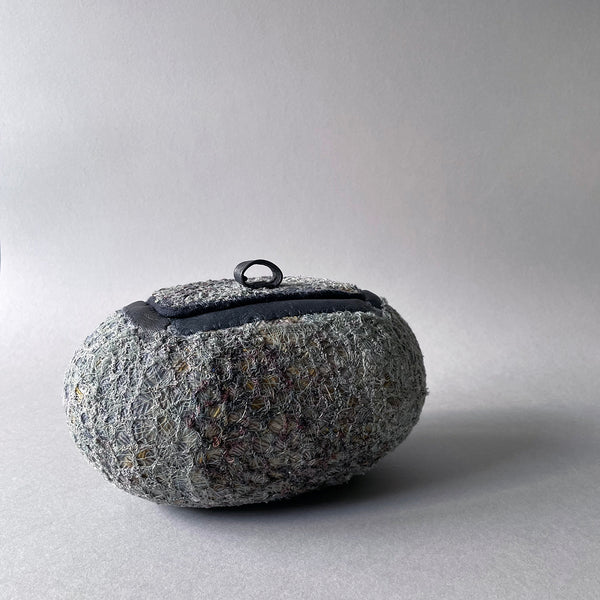 Hand stitched vessel