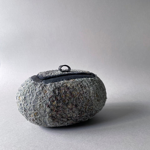 Hand stitched vessel