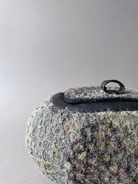 Hand stitched vessel