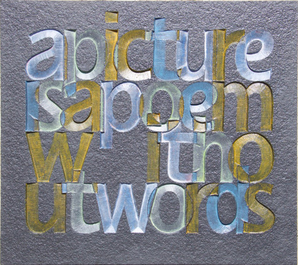 A picture paints. Carved and coloured grey slate by Annet Stirling